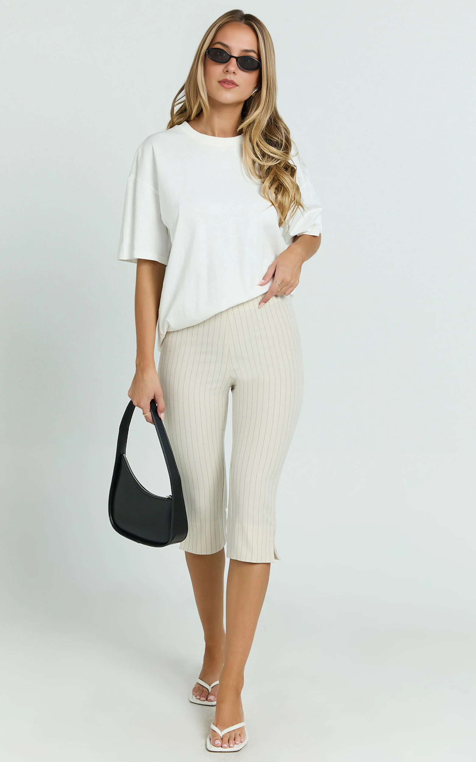 Susannah Cream Pinstripe Split-Hem Cropped Trousers – Tailored Elegance in Motion