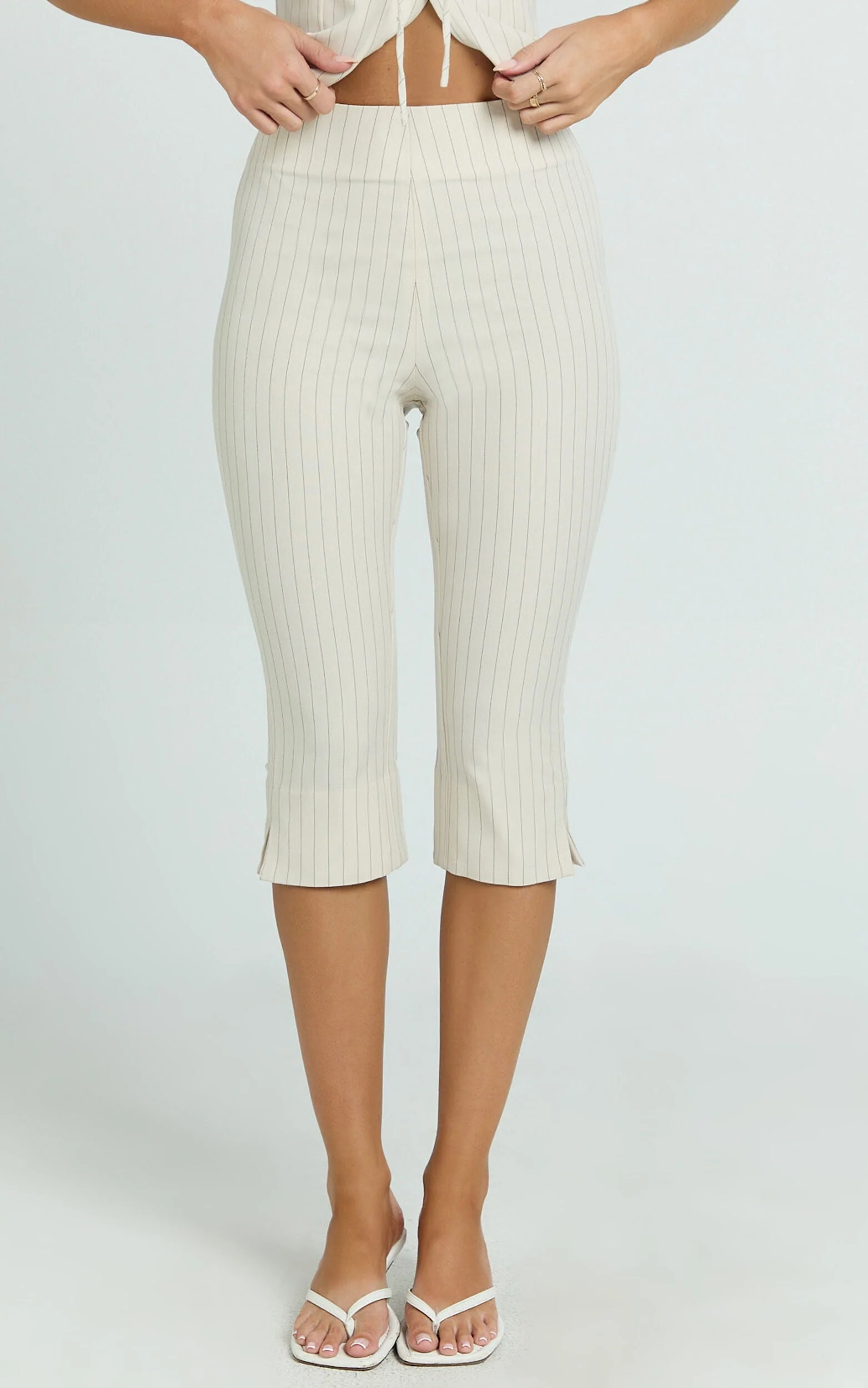 Susannah Cream Pinstripe Split-Hem Cropped Trousers – Tailored Elegance in Motion